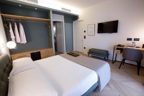 Postel nebo postele na pokoji v ubytování Hotel Silla