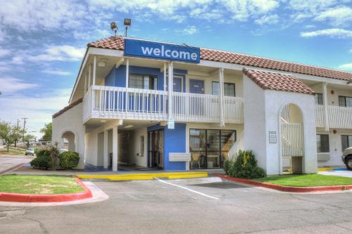 a hotel with a welcome sign in a parking lot at Motel 6-El Paso, TX - East in El Paso