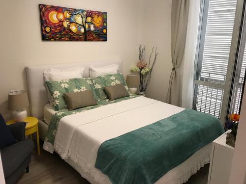 Кровать или кровати в номере Appartamento San Pietro Firenze