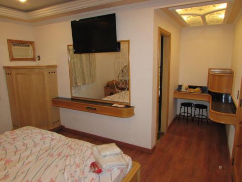 Pleasant Place Hotelにあるベッド