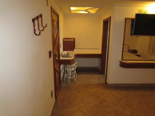 Pleasant Place Hotelにあるテレビまたはエンターテインメントセンター