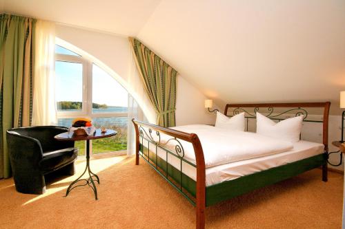 Postel nebo postele na pokoji v ubytování Hotel Nautilus