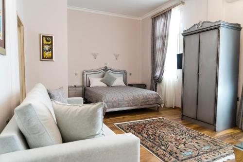 Ένα ή περισσότερα κρεβάτια σε δωμάτιο στο Le Bijou Luxury Rooms & Suites