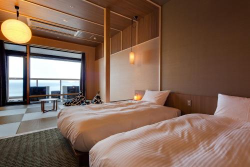 Ліжко або ліжка в номері Hanagoyomi