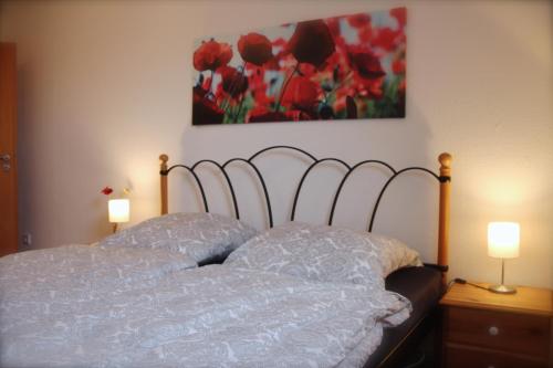 Postel nebo postele na pokoji v ubytování Ferienwohnung Kirchturmblick Euren
