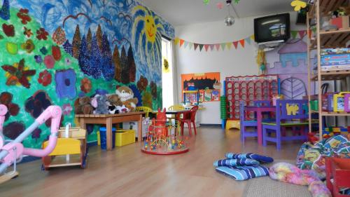a room filled with lots of different types of toys at Hotel La Campagnola - Green Energy Resort in San Nazzaro