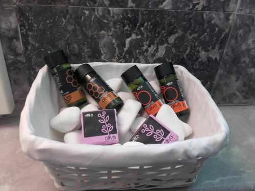 a basket filled with different types of soap and cosmetics at Santa Irene in Sougia