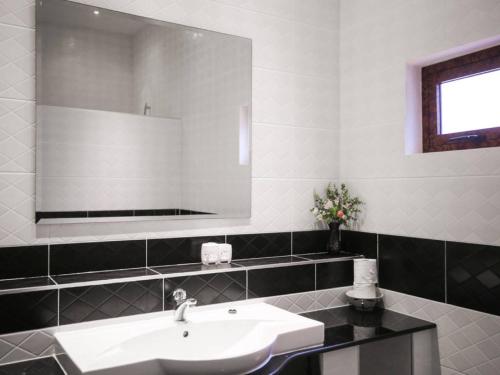 a bathroom with a sink and a mirror at 5 Bedroom Seafront Villa Phangan SDV231-By Samui Dream Villas in Srithanu
