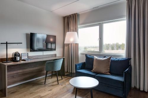 Televisyen dan/atau pusat hiburan di Quality Airport Hotel Gardermoen