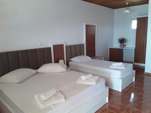 Postel nebo postele na pokoji v ubytování Hotel Riviera