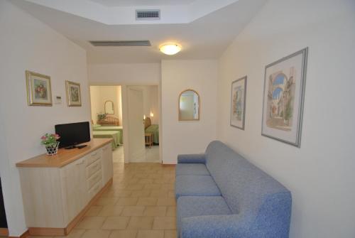 Fotografie z fotogalerie ubytování Appartamenti Olivo - 100 mt dal mare con aria condizionata v destinaci Marina di Campo