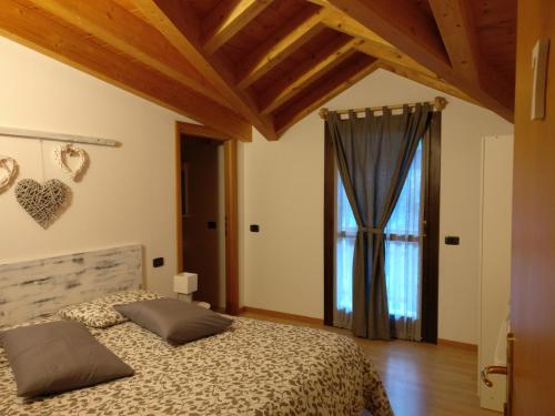 Katil atau katil-katil dalam bilik di Garnì Al Laghet