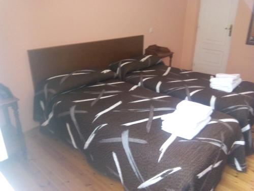 Postel nebo postele na pokoji v ubytování Hotel Las Grandas