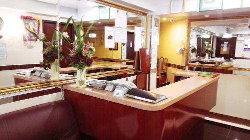 City HK Guest House 24 HOUR RECEPTION Block D & E 10TH FLOOR