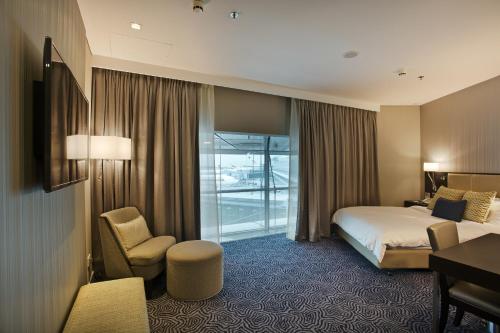 เตียงในห้องที่ Ambassador Transit Hotel - Terminal 3