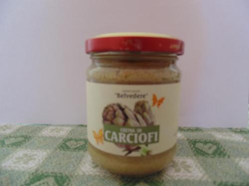a jar of nuts sitting on a table at Bigotti in Fano