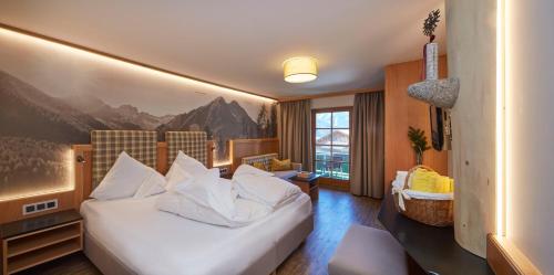 Imagen de la galería de Alpenrose Wellnesshotel, en Elbigenalp