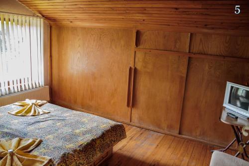 Postel nebo postele na pokoji v ubytování Villa Ribarica