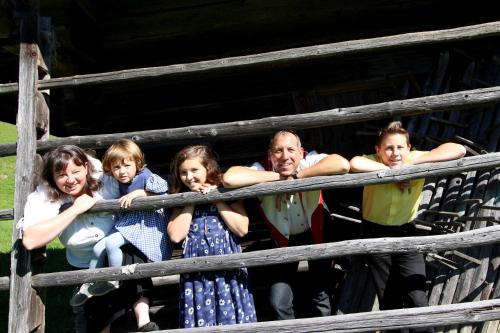 a group of people standing on a rail at Das kleine Berghotel in Liesing