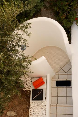 an outside view of a kitchen with a table at Casa Aiora in Adamas
