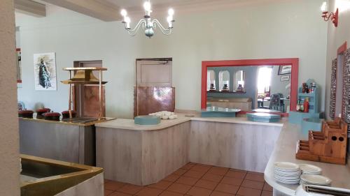 A kitchen or kitchenette at Lamberts Bay Hotel