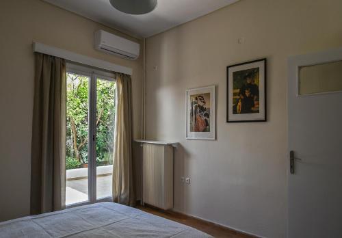Posteľ alebo postele v izbe v ubytovaní Miranda's Apartment in Thissio