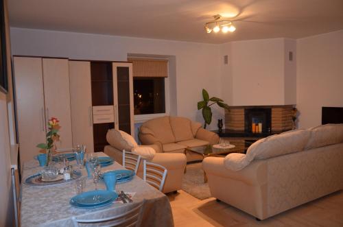Posezení v ubytování Apartments with outdoor SPA jacuzzi and sauna