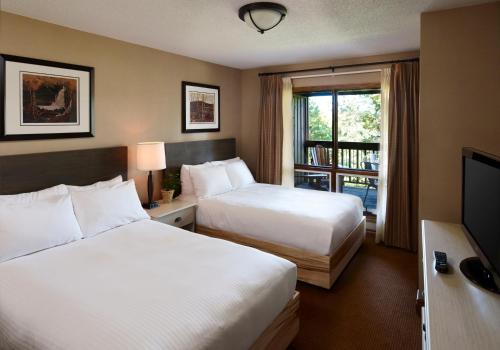 Postel nebo postele na pokoji v ubytování Deerhurst Resort