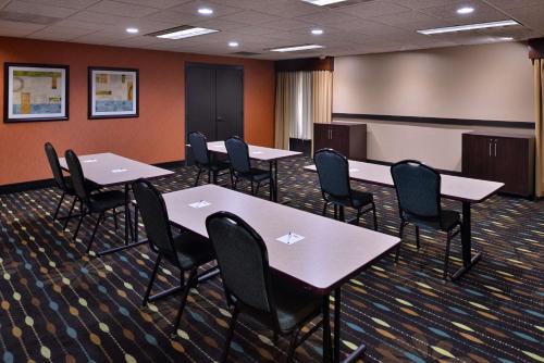 a conference room with tables and chairs in it at Best Western Plus Wichita West Airport Inn in Wichita