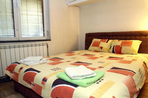 Säng eller sängar i ett rum på Belgrade Republic Square Apartment