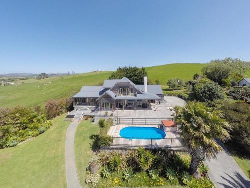 an aerial view of a house with a swimming pool at Strathaven Bed and Breakfast in Waipu