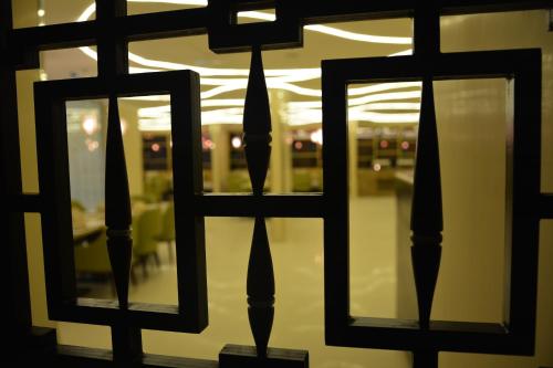 a view through a window of a room at Prime Al Hamra Hotel in Jeddah