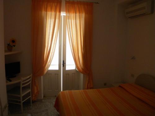 Postel nebo postele na pokoji v ubytování Hotel Parco Conte