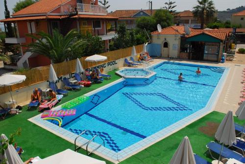 an overhead view of a swimming pool at a resort at Tom & John Center in Tsilivi