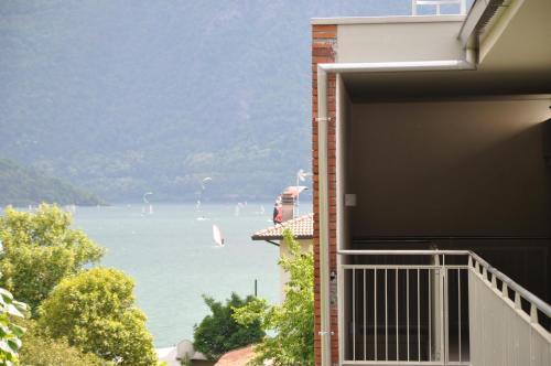 a view of the ocean from a balcony of a house at Hotel Vischi in Domaso