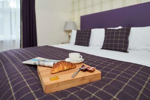 Katil atau katil-katil dalam bilik di Braid Apartments by Mansley