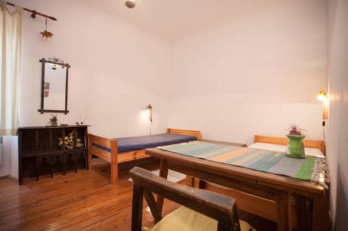 En eller flere senge i et værelse på Apartment Bing- city center