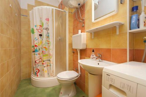 Et badeværelse på Apartment Bing- city center