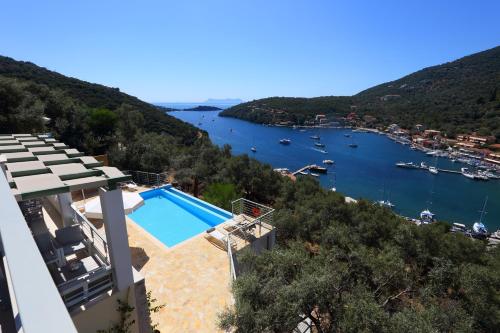 a villa with a view of a body of water at Ktima Aniforeli Luxury Villas in Sivota