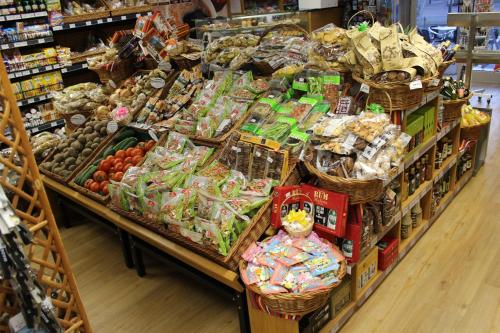 a grocery store aisle with a lot of produce at Apartamentos Turisticos Paraiso in Funchal