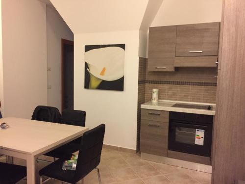 Kuchyňa alebo kuchynka v ubytovaní Salieri Apartment
