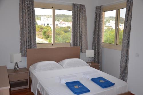 Postel nebo postele na pokoji v ubytování Anthorina Villa 8