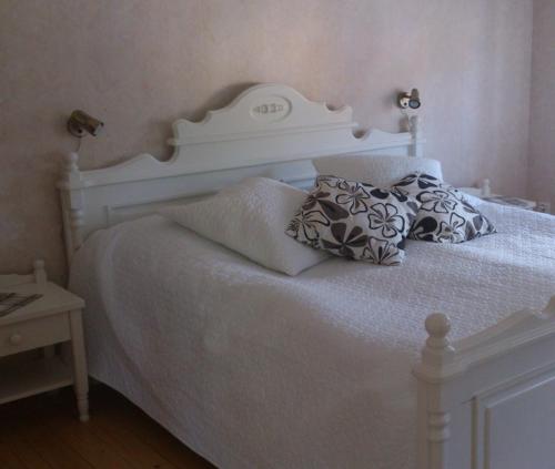 Postel nebo postele na pokoji v ubytování Manes Apartment