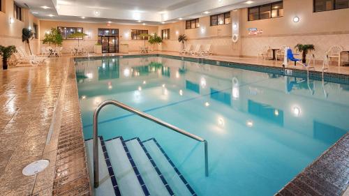 a large swimming pool in a hotel at Best Western Ramkota Hotel in Rapid City