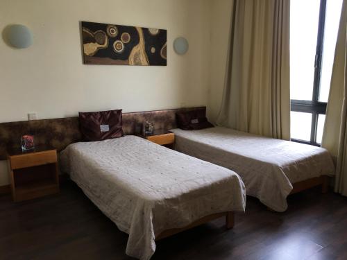 Ein Bett oder Betten in einem Zimmer der Unterkunft Fiel Chef Alojamento Local