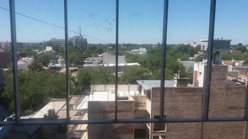 a view of a city from a window at Departamento Centrico in Mendoza