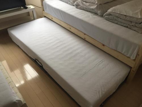 Ένα ή περισσότερα κρεβάτια σε δωμάτιο στο Sophiearth Apartment