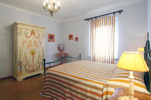 Postel nebo postele na pokoji v ubytování Agriturismi Farina