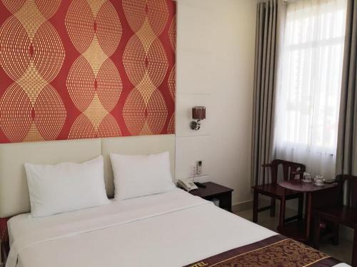 Katil atau katil-katil dalam bilik di Lilly Hotel