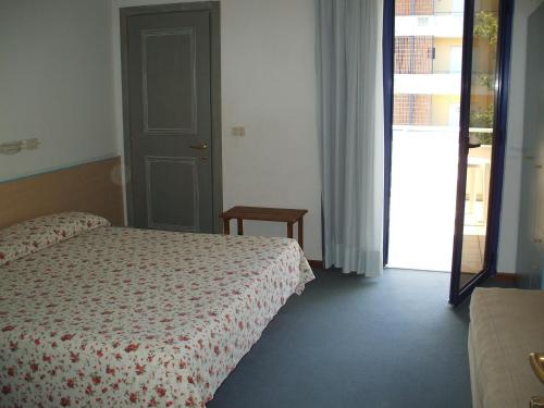 Ένα ή περισσότερα κρεβάτια σε δωμάτιο στο Hotel Splendor